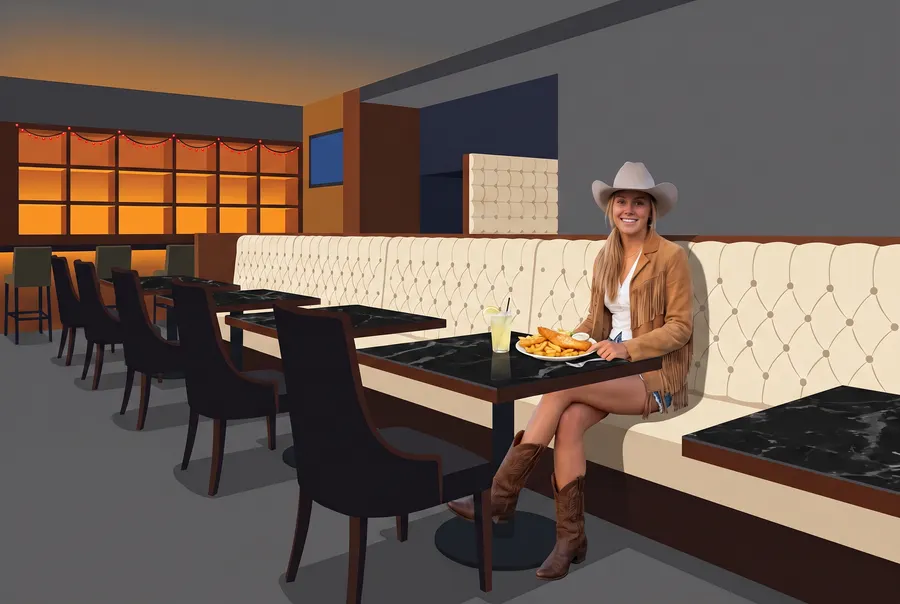 Woman in a cowboy hat on a tufted banquette in the pub